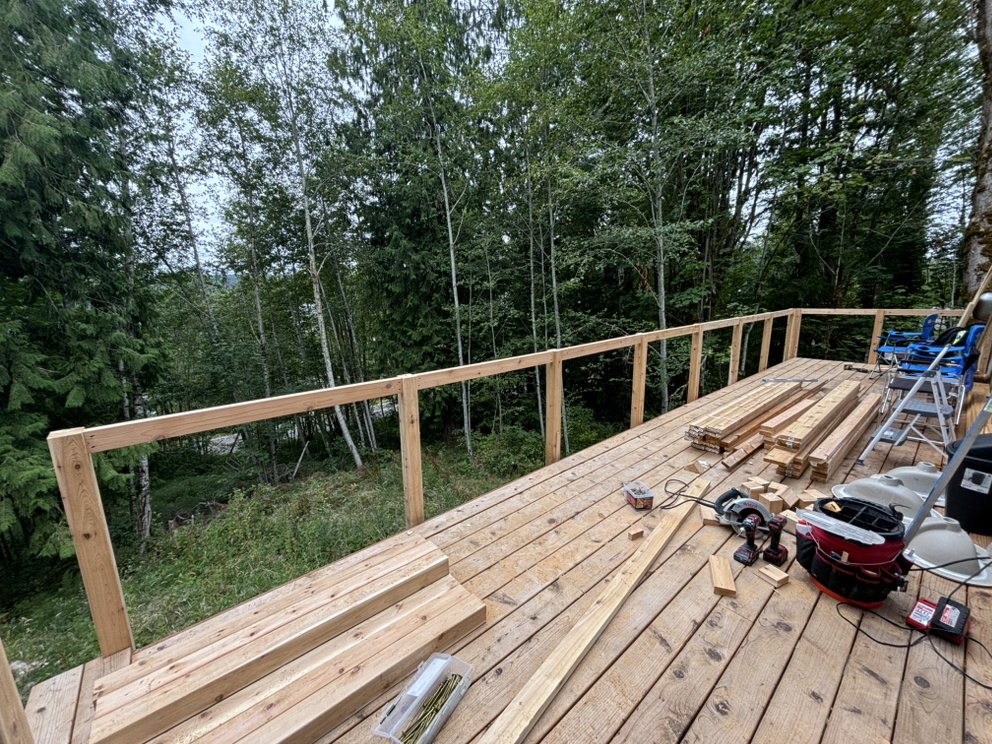 Deck construction in progress — framing and decking